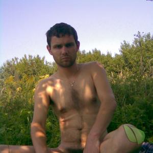A guy out hiking in the wilderness