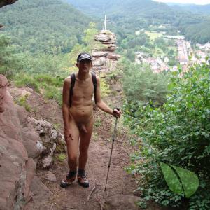 A nudist trekking in nature