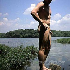 A guy relaxing in the pool
