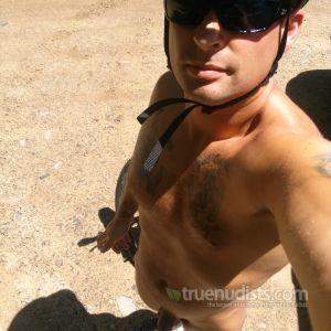 One dude playing sports in the wilderness